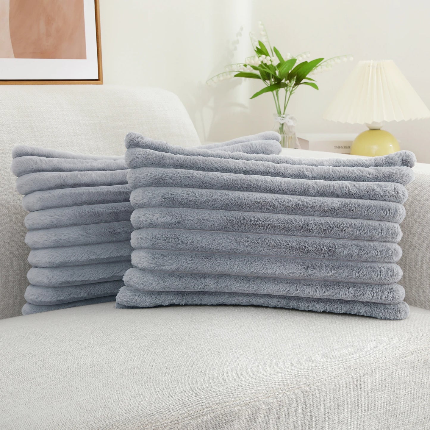 Get your kids' bedroom or playroom looking fresh and funky with this grey faux fur pillow cover. These decorative throw pillow covers are crafted from plush fabric on both sides, ensuring a luxuriously cozy and cuddly feel. Say hello to comfort and style with this one-of-a-kind accent piece.