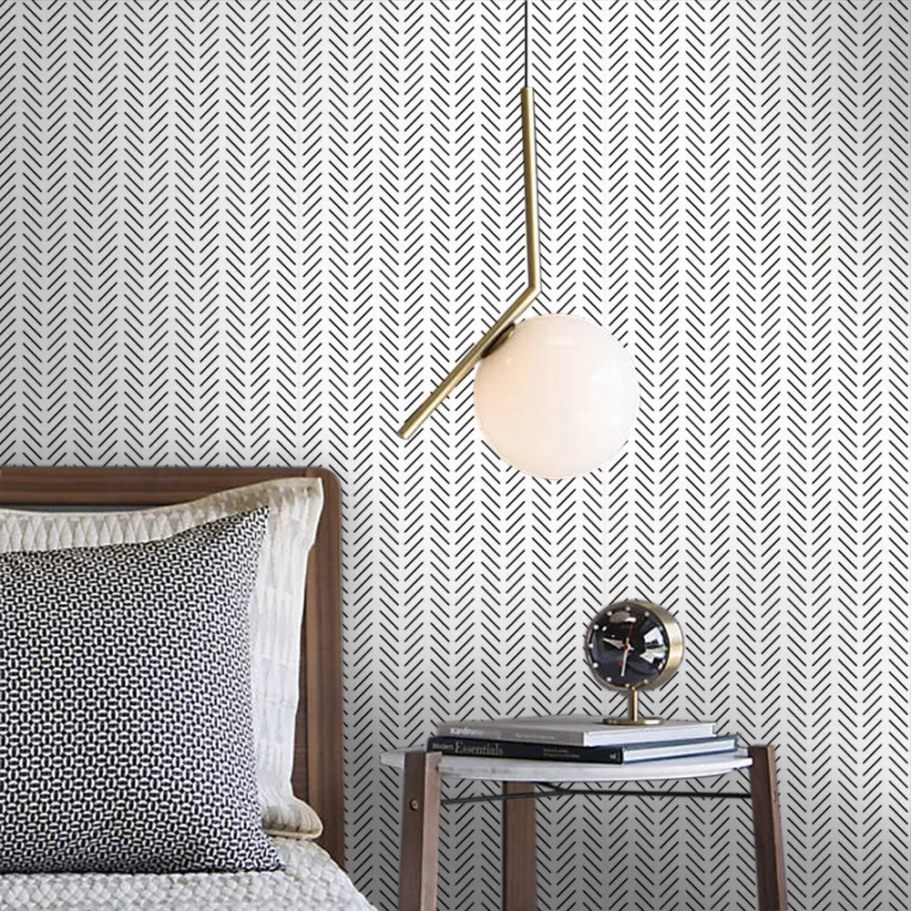 This herringbone wallpaper is the perfect way to add a touch of modern style and comfort to your kid's bedroom. Available in grey/white and black/white, the waterproof and formaldehyde-free vinyl material is easy to install, and fireproof, mildew-resistant and moisture-proof for lasting durability. Transform any bedroom with this stylish, practical wallpaper!