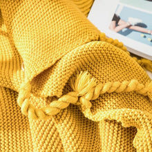 Load image into Gallery viewer, Delight in soft comfort with this luxurious mustard yellow knitted throw blanket! Perfectly light and delightfully cuddly, your little one will love snuggling up with this cozy and stylish addition to their bedroom. Make every bedroom searching session a warm and inviting one!  Size: 50 x 62 inches (130cm x 160cm). Material: 100% high quality acrylic.  Machine wash colors separately wash in cold water, gentle cycle, tumble dry low, low iron.
