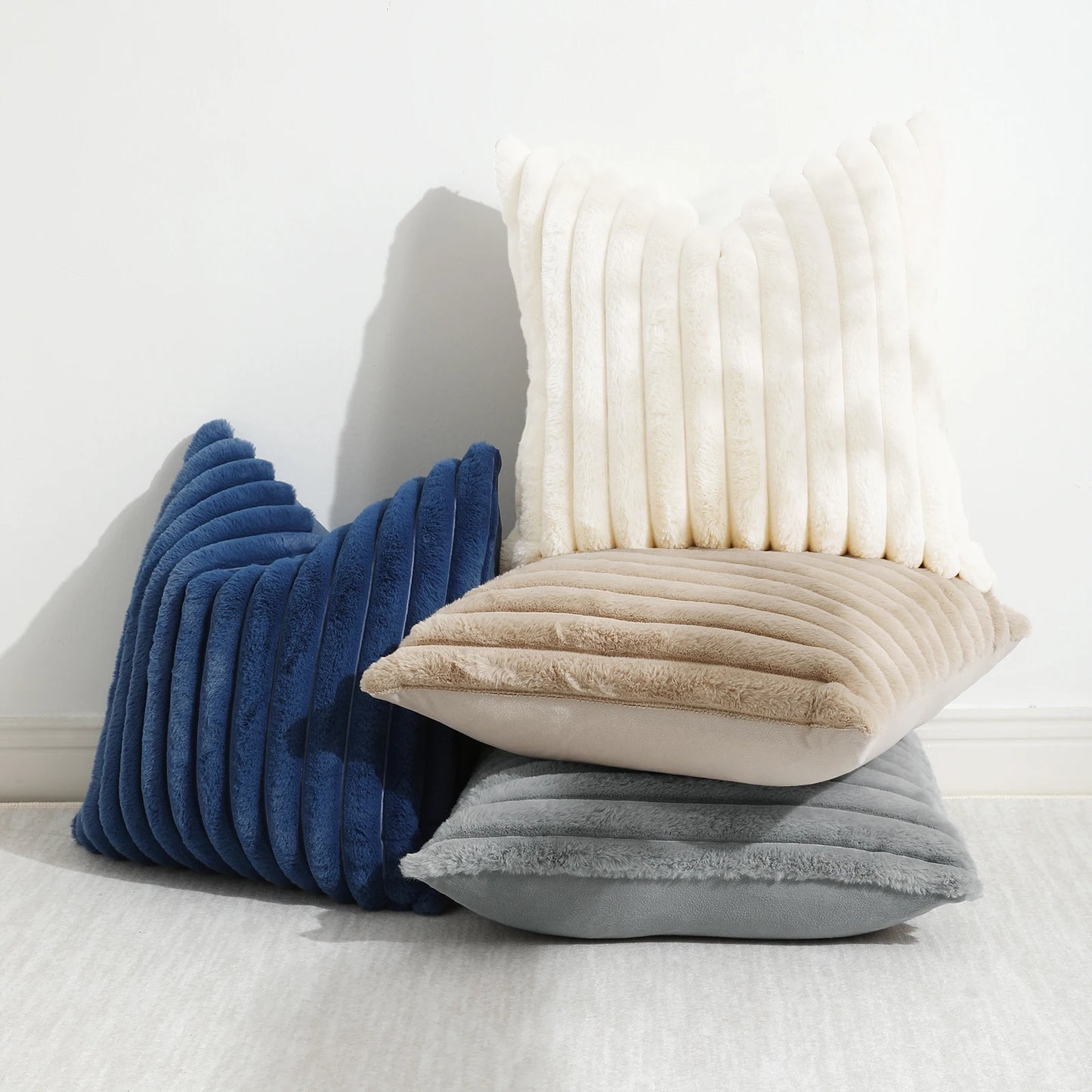 Get your kids' bedroom or playroom looking fresh and funky with this blue faux fur pillow cover. These decorative throw pillow covers are crafted from plush fabric on both sides, ensuring a luxuriously cozy and cuddly feel. Say hello to comfort and style with this one-of-a-kind accent piece.