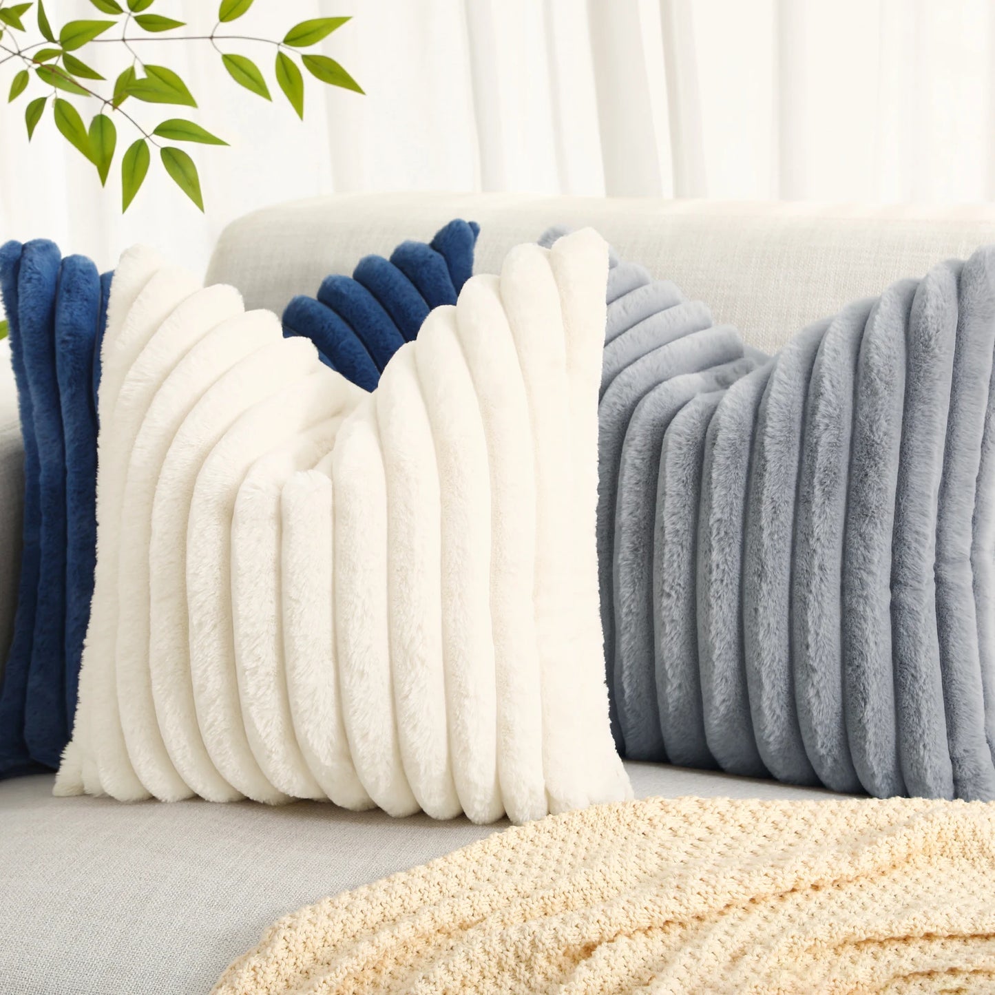 Get your kids' bedroom or playroom looking fresh and funky with this blue faux fur pillow cover. These decorative throw pillow covers are crafted from plush fabric on both sides, ensuring a luxuriously cozy and cuddly feel. Say hello to comfort and style with this one-of-a-kind accent piece.