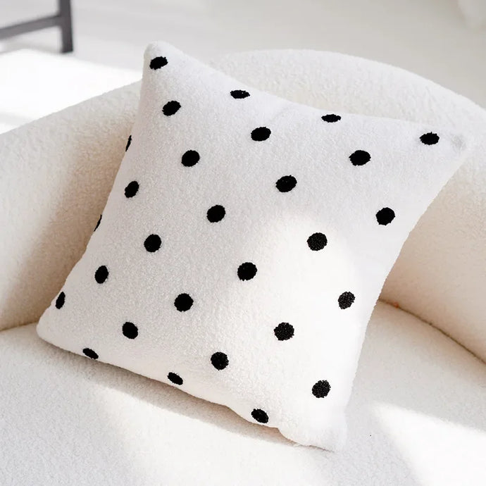 Turn your child's bedroom into a fun and playful space with this adorable pillow cover! Available in both classic black and white or cozy brown. (Note: pillow insert not included, so get creative!)