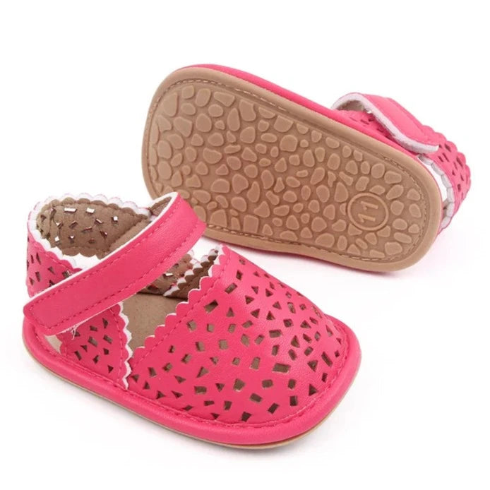 There's nothing cuter than watching your little one take their first steps in our Barcelona Baby Sandals! Available in magenta, white, brown, and black, these non-slip casual shoes feature soft soles for maximum comfort and support. Perfect for little explorers on the go, you can trust that our sandals will keep your baby's precious feet safe and comfy all day long. Give them the gift of style and functionality with our versatile Barcelona Baby Sandals! 