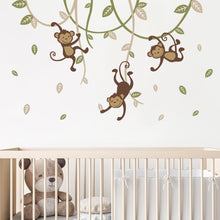 Load image into Gallery viewer, Bring a wild jungle into your kids&#39; bedroom with our fun and unique Jungle Monkeys Wall Decal! Made of durable PVC material, this peel and stick decal is easy to use and – don’t worry – completely removable when you’re ready for a decor switch-up. Get your family of monkeys movin&#39; and groovin&#39; on the wall in no time!
