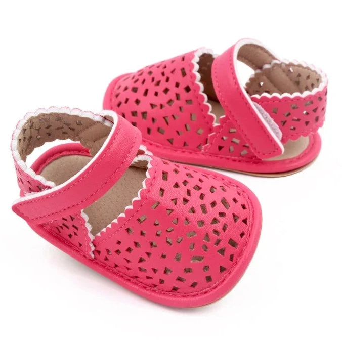 There's nothing cuter than watching your little one take their first steps in our Barcelona Baby Sandals! Available in magenta, white, brown, and black, these non-slip casual shoes feature soft soles for maximum comfort and support. Perfect for little explorers on the go, you can trust that our sandals will keep your baby's precious feet safe and comfy all day long. Give them the gift of style and functionality with our versatile Barcelona Baby Sandals! 