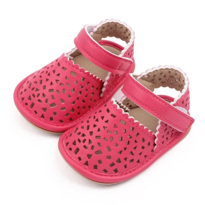 There's nothing cuter than watching your little one take their first steps in our Barcelona Baby Sandals! Available in magenta, white, brown, and black, these non-slip casual shoes feature soft soles for maximum comfort and support. Perfect for little explorers on the go, you can trust that our sandals will keep your baby's precious feet safe and comfy all day long. Give them the gift of style and functionality with our versatile Barcelona Baby Sandals! 