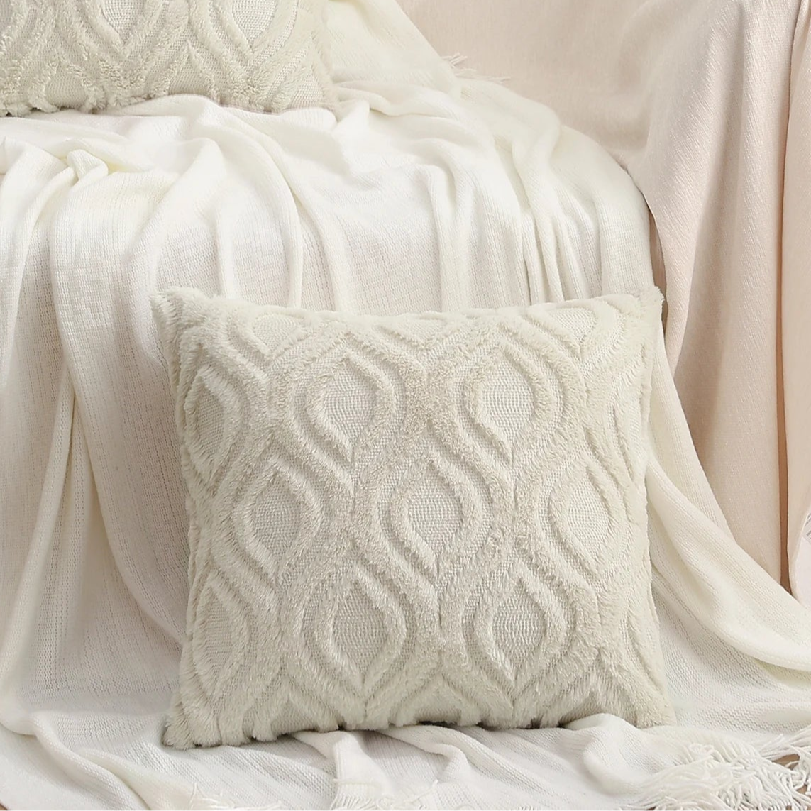 Get your kids' bedroom or playroom looking fresh and funky with this beige geometric pillow cover. These decorative throw pillow covers are crafted from fluffy flannel fabric on both sides, ensuring a luxuriously cozy and cuddly feel. Say hello to comfort and style with this one-of-a-kind accent piece.