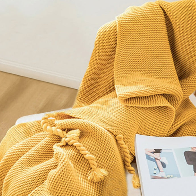 Delight in soft comfort with this luxurious mustard yellow knitted throw blanket! Perfectly light and delightfully cuddly, your little one will love snuggling up with this cozy and stylish addition to their bedroom. Make every bedroom searching session a warm and inviting one!  Size: 50 x 62 inches (130cm x 160cm). Material: 100% high quality acrylic.  Machine wash colors separately wash in cold water, gentle cycle, tumble dry low, low iron.