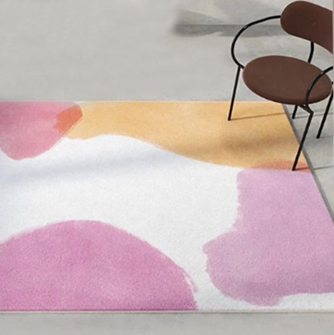 Make your kid's room a modern masterpiece with this eye-catching pink and orange watercolor rug! Crafted from 100% polyester for easy cleaning, this rug will bring some vibrant color to any kid's room. Get ready to be the envy of all your kid's friends!
