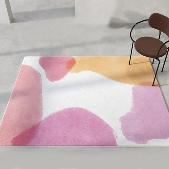 Make your kid's room a modern masterpiece with this eye-catching pink and orange watercolor rug! Crafted from 100% polyester for easy cleaning, this rug will bring some vibrant color to any kid's room. Get ready to be the envy of all your kid's friends!