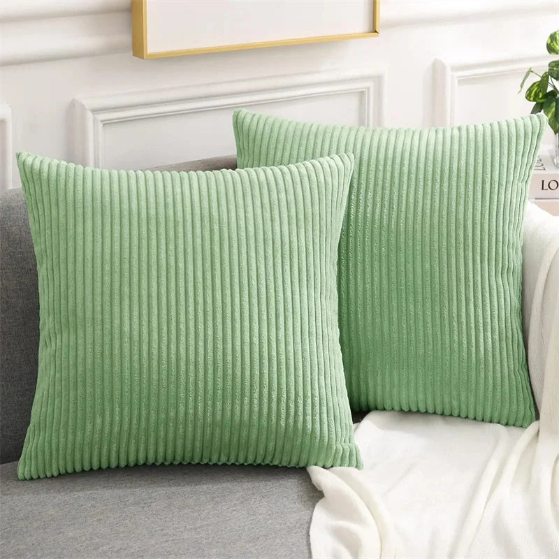 Get your kids' bedroom or playroom looking fresh and funky with this Sage Green Corduroy Pillow Cover. These decorative throw pillow covers are crafted from fluffy flannel fabric on both sides, ensuring a luxuriously cozy and cuddly feel. Say hello to comfort and style with this one-of-a-kind accent piece.