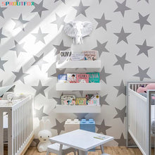 Load image into Gallery viewer, Cool star wall decals for your nursery or kid&#39;s bedroom. These stars come in grey, blue, pink, yellow, green, purple and green. Material: waterproof PVC. Easy to apply, remove, and reposition. View image with instructions on how to apply.
