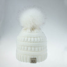 Load image into Gallery viewer, Keep your kid warm with this white beanie hat. Great for children age 1 to 7 years. This knitted cotton hat comes in red, yellow, beige, pink, black, white and grey.
