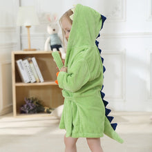 Load image into Gallery viewer, The perfect dinosaur hooded green bathrobe for kids ages 2 to 6 years. This bathrobe comes in blue, green and pink. Material: Cotton. Fabric Type: Worsted.
