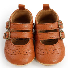 Load image into Gallery viewer, These brown leather shoes are perfect for your first time crawler and walker. These soft sole shoes are for baby girls ages 0 to 18 months old girl. Free shipping.
