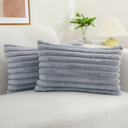 Get your kids' bedroom or playroom looking fresh and funky with this grey faux fur pillow cover. These decorative throw pillow covers are crafted from plush fabric on both sides, ensuring a luxuriously cozy and cuddly feel. Say hello to comfort and style with this one-of-a-kind accent piece.