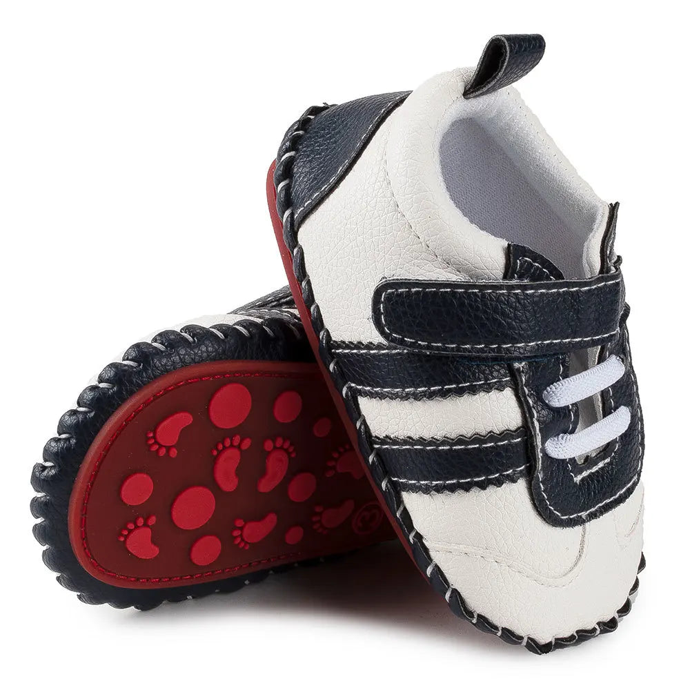 Wrap your little one's feet in comfort and style with Nimar Baby Sneakers. Designed for the tiniest toes, they are perfect for crawling, cruising, and those first steps. The rubber bottom ensures safety and stability while the soft and lightweight material provides ultimate comfort. Choose from multiple colors and sizes for a perfect fit for your precious angel. Tread with confidence knowing your little one is wearing the best quality footwear.