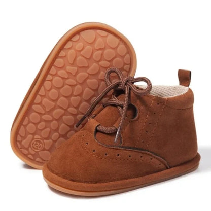 Get ready to "aww" over these adorable baby boots, available in brown or black for your little angel. They boast anti-slip technology, a flat design, breathable material, and are lightweight for your little one's comfort.