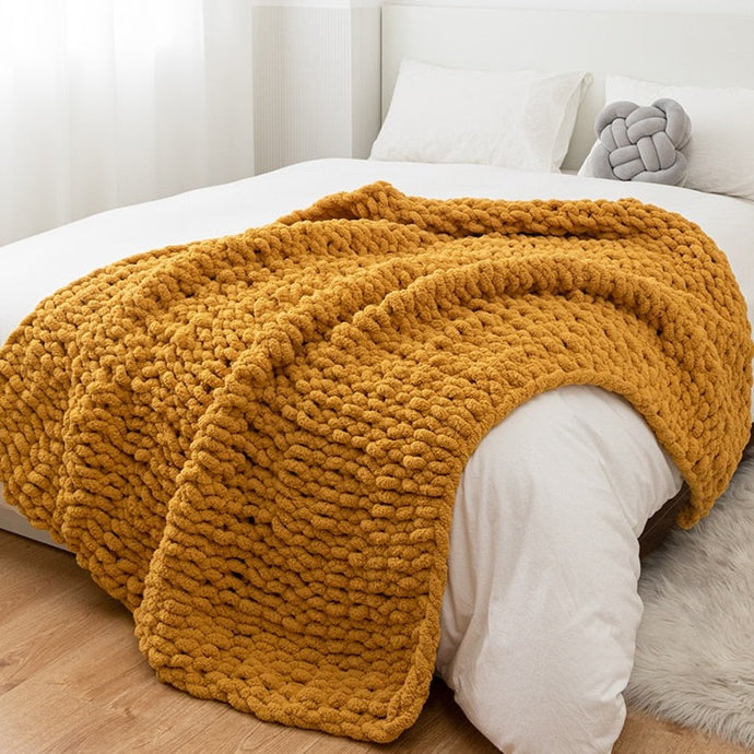 Bring some much-needed warmth to your little one's bedroom with this Dark Yellow Knitted Throw Blanket. Soft, cozy, and the perfect mustard yellow, this blanket will keep your kid snug as a bug in a rug! (Or as warm as a pumpkin spice latte!)  Size: 50 x 62 inches (130cm x 160cm) Material: High quality acrylic. Machine wash colors separately wash in cold water, gentle cycle, tumble dry low, low iron. For kids 6 and up. 