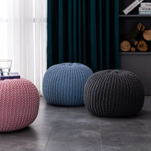 Load image into Gallery viewer, This hand-woven footstool offers an inviting place to sit and relax. It&#39;s crafted with 100% wool yarn, making it durable and comfortable. Its soft blue hue adds a splash of color to any room, while its light and airy design is perfect for kids.
