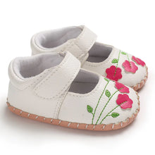 Load image into Gallery viewer, Soft and delicate baby shoes for children aged newborn to 18 months. Boasting an anti-slip design, these flats are breathable and lightweight, making them perfect for little ones on the move.
