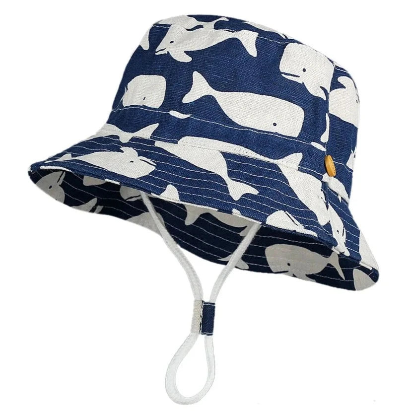 Experience the ultimate comfort and protection for your little one this summer with the blue whale bucket hat. Made from the softest cotton, this hat is perfect for keeping your baby or toddler cool and stylish under the hot sun.