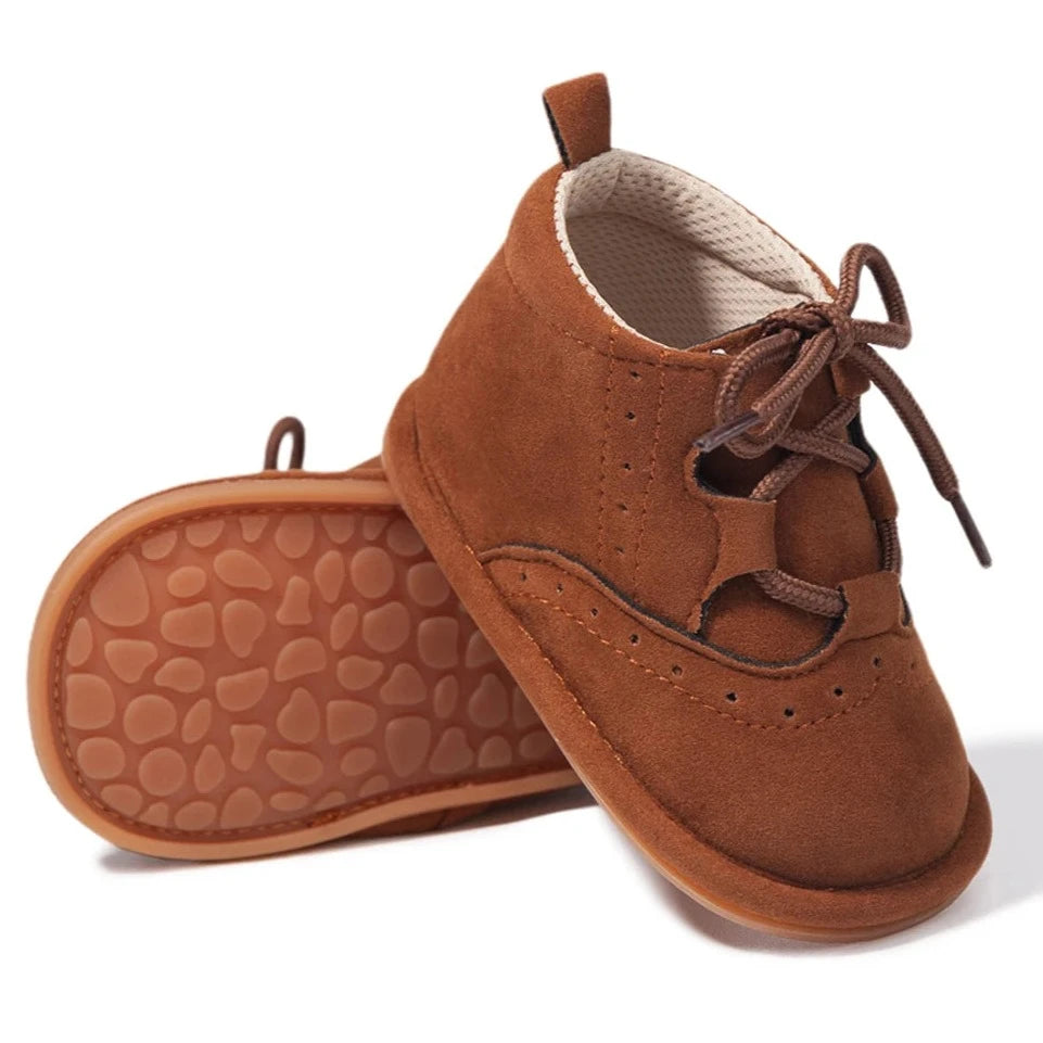 Get ready to "aww" over these adorable baby boots, available in brown or black for your little angel. They boast anti-slip technology, a flat design, breathable material, and are lightweight for your little one's comfort.