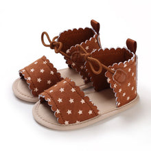 Load image into Gallery viewer, Adorable and stylish, Roma brown stars sandals come in a variety of colors to keep your little one looking adorable. Perfect for newborns and toddlers up to 18 months old, these sandals are sure to complete any outfit.  Upper Material: PU Leather Outsole Material: Cotton Heel Type: Flat 
