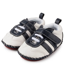 Load image into Gallery viewer, Wrap your little one&#39;s feet in comfort and style with Nimar Baby Sneakers. Designed for the tiniest toes, they are perfect for crawling, cruising, and those first steps. The rubber bottom ensures safety and stability while the soft and lightweight material provides ultimate comfort. Choose from multiple colors and sizes for a perfect fit for your precious angel. Tread with confidence knowing your little one is wearing the best quality footwear.
