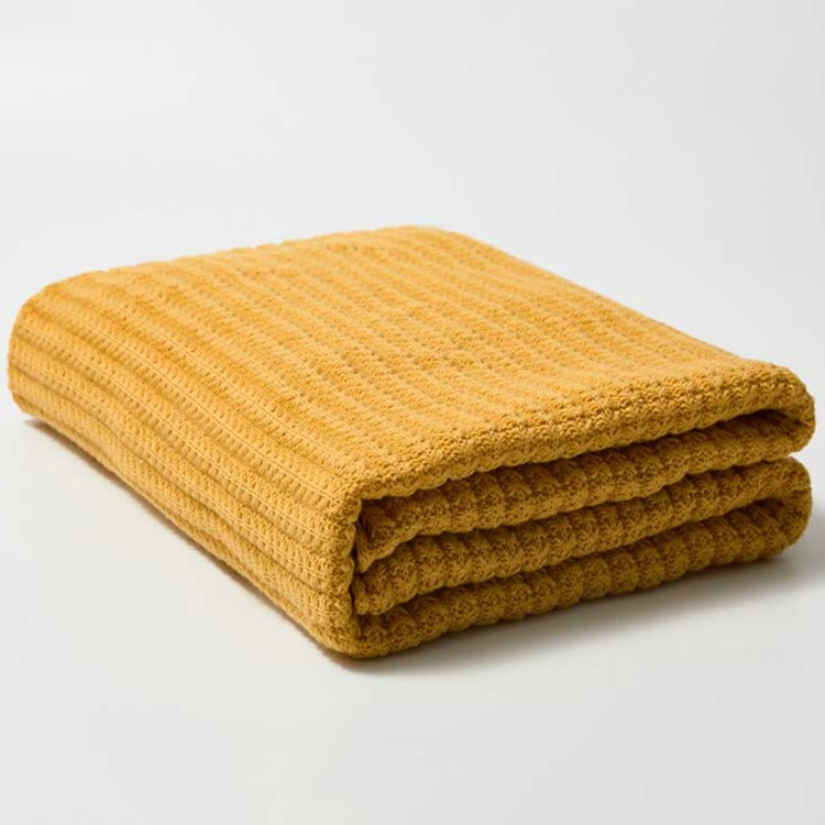 Bring the warmth of comfort with a touch of style to any room with this classic yellow throw blanket. Knitted from lightweight material, it's soft against the skin for luxurious snuggling of your little one. Enjoy cozy nights all year round in luxurious softness.  Size: 50 x 62 inches (127cm x 157cm) Material: 100% High Quality Acrylic Machine Wash: Color separate in a gentle cold water cycle. Tumble dry low, Low iron.