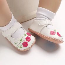 Load image into Gallery viewer, Soft and delicate baby shoes for children aged newborn to 18 months. Boasting an anti-slip design, these flats are breathable and lightweight, making them perfect for little ones on the move.
