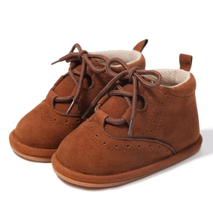 Get ready to "aww" over these adorable baby boots, available in brown or black for your little angel. They boast anti-slip technology, a flat design, breathable material, and are lightweight for your little one's comfort.