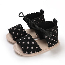 Load image into Gallery viewer, Adorable and stylish, Roma black stars  sandals come in a variety of colors to keep your little one looking adorable. Perfect for newborns and toddlers up to 18 months old, these sandals are sure to complete any outfit.  Upper Material: PU Leather Outsole Material: Cotton Heel Type: Flat 
