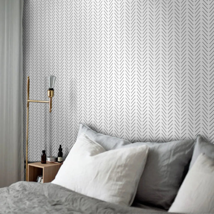 This herringbone wallpaper is the perfect way to add a touch of modern style and comfort to your kid's bedroom. Available in grey/white and black/white, the waterproof and formaldehyde-free vinyl material is easy to install, and fireproof, mildew-resistant and moisture-proof for lasting durability. Transform any bedroom with this stylish, practical wallpaper!