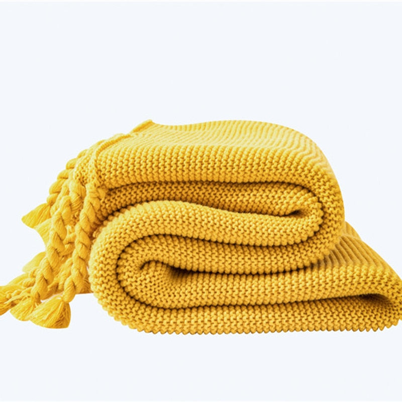 Delight in soft comfort with this luxurious mustard yellow knitted throw blanket! Perfectly light and delightfully cuddly, your little one will love snuggling up with this cozy and stylish addition to their bedroom. Make every bedroom searching session a warm and inviting one!  Size: 50 x 62 inches (130cm x 160cm). Material: 100% high quality acrylic.  Machine wash colors separately wash in cold water, gentle cycle, tumble dry low, low iron.