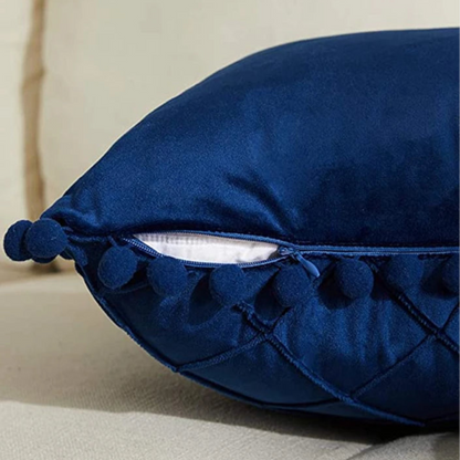 Transform your child's bedroom or playroom into a stylish and modern space with the Dark blue Pompom Pillow Cover. Made from a soft faux velvet material on both sides, this decorative throw pillow cover provides the perfect combination of comfort and luxury. Add a unique touch to any room with this must-have accent piece.