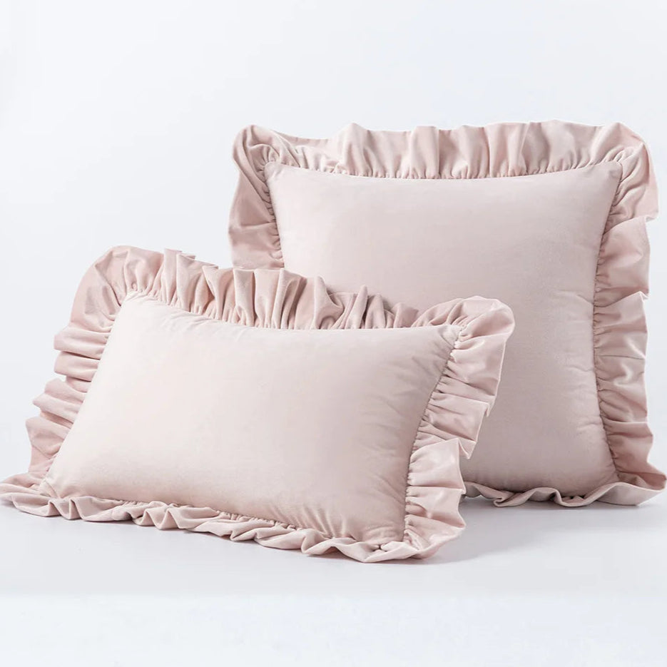 Elevate the playfulness and character of your kid's bedroom or playroom with this one-of-a-kind pink ruffled throw pillow cover. Made from plush velvet, this charming accessory adds a touch of luxury and flair. Create a snug and trendy atmosphere in your space by adding this extraordinary accent.