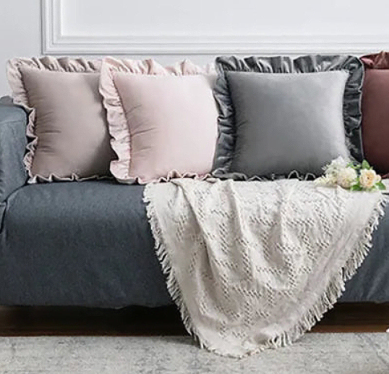 Elevate the playfulness and character of your kid's bedroom or playroom with this one-of-a-kind pink ruffled throw pillow cover. Made from plush velvet, this charming accessory adds a touch of luxury and flair. Create a snug and trendy atmosphere in your space by adding this extraordinary accent.