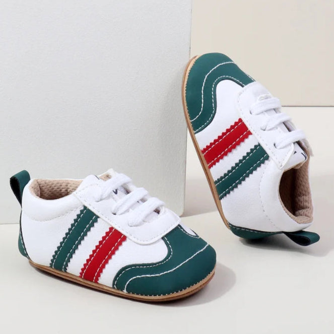Designed with expert precision, these baby sneakers are crafted to fit children aged newborn through 18 months old with ultimate comfort and style.