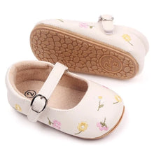 Load image into Gallery viewer, Get ready for your little one to step out in style and comfort with these charming embroidered baby shoes! The delicate butterfly-knot design adds a touch of whimsy to any outfit, making your baby the center of attention wherever you go. Perfect for newborns up to 18 months, these shoes will keep your baby&#39;s feet cozy and supported as they grow and explore the world around them. Give your baby the gift of fashion and function with these adorable baby shoes
