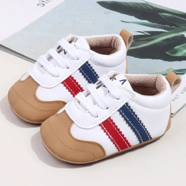 Designed with expert precision, these baby sneakers are crafted to fit children aged newborn through 18 months old with ultimate comfort and style.