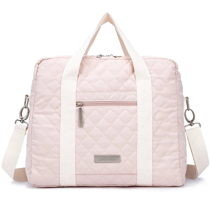 Cool stylish pink diaper bag for mom. This diaper bag is perfect for the fashionable mom. It's made of durable materials and features a sleek pink design.