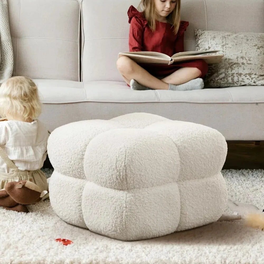 This cloud ottoman boasts an elegant but daring design, upholstered in chic nepal sherpa fabric. Its bold textured tufting and divided, equant cubed sections on each side add both visual and functional drama.