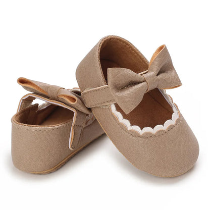 Indulge your little one's feet with our adorable Mary Jane baby shoes in a selection of sweet colors. Perfect for newborns through 18 months old, choose from white, black, apricot, and brown to match any outfit.