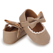 Load image into Gallery viewer, Indulge your little one&#39;s feet with our adorable Mary Jane baby shoes in a selection of sweet colors. Perfect for newborns through 18 months old, choose from white, black, apricot, and brown to match any outfit.
