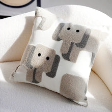 Load image into Gallery viewer, Transform your child&#39;s bedroom into a whimsical oasis with our Little Grey Elephants Pillow Case. Available in multiple sizes, this adorable pillow cover features cute white and grey elephants that will add a charming touch to any room. Livieboo kids Home decor New York
