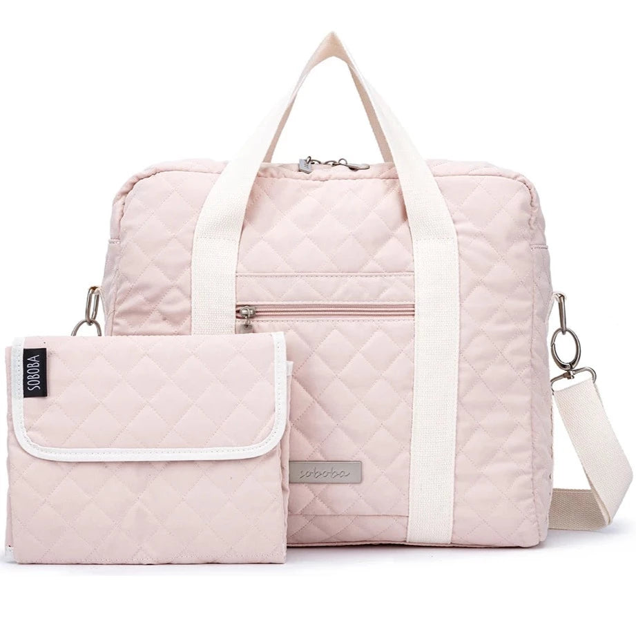 The Pink Messenger Diaper Bag is a must-have for any fashion-forward mom. Made with durable materials and a sleek pink design, this bag exudes both style and functionality.