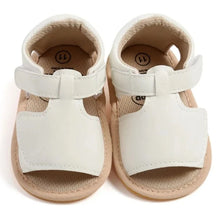 Load image into Gallery viewer, Made with soft materials and designed especially for newborns to 18 month olds, they are the perfect addition to any baby&#39;s wardrobe. Your little one will look and feel great while wearing these sandals, and you&#39;ll love the convenience of finding a quality pair of shoes that will grow with them. Don&#39;t miss out on giving your baby the best sandals for their growing feet!
