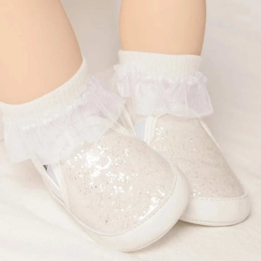 Not only will your little angel look fashionable in these stylish gold, silver and white baby loafers, but they will also stay safe and comfortable with their anti-slip, soft-sole design. Perfect for newborns up to 18 months, these shoes are easy to put on and take off, making your life as a busy parent a little easier. Provide your child with both fashion and function with our sparkling loafers in multiple colors and sizes.