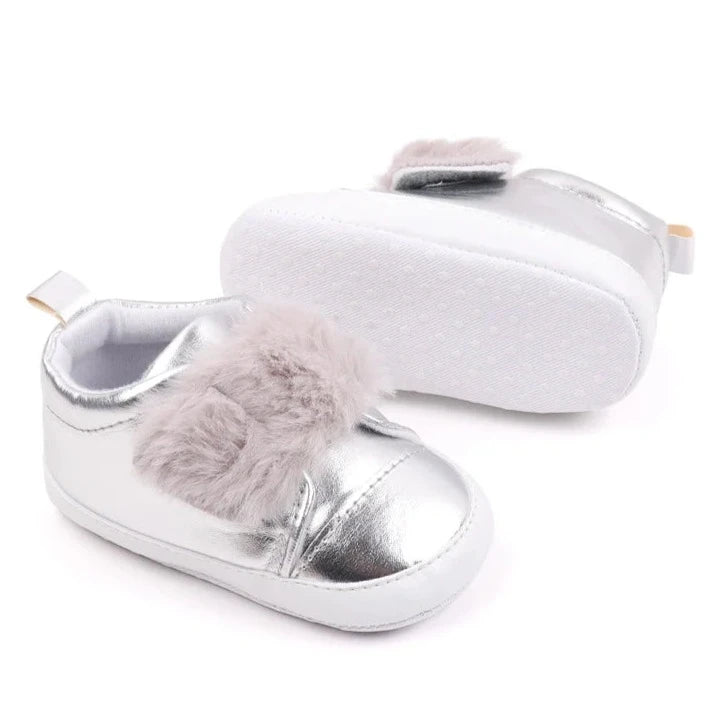 Discover the most adorable infant silver footwear available for newborns up to 18 months! Our selection boasts rose gold, glossy black, and shimmering silver options. These non-slip, cozy shoes feature soft soles perfect for everyday wear.